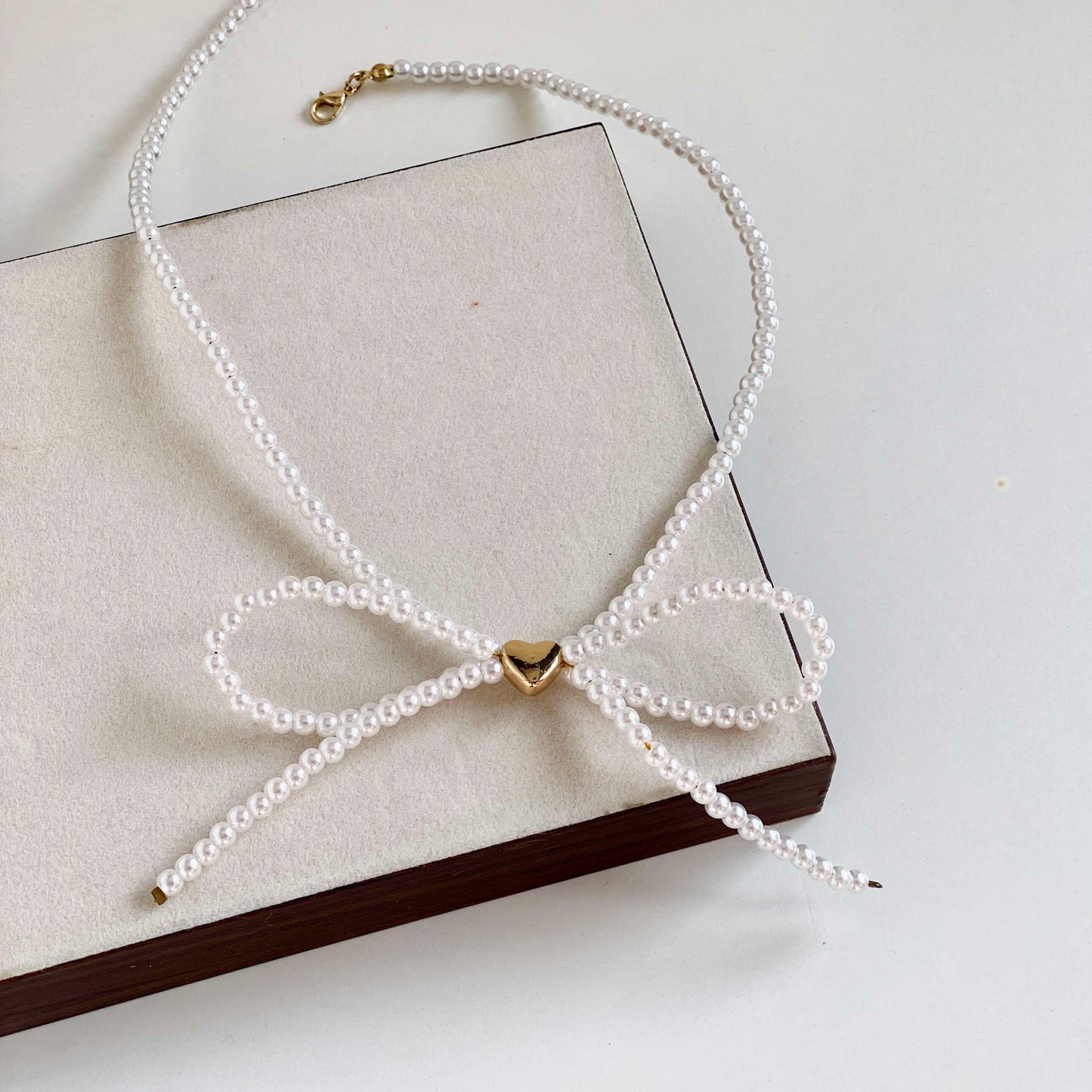 Coquette Pearl Bow Necklace