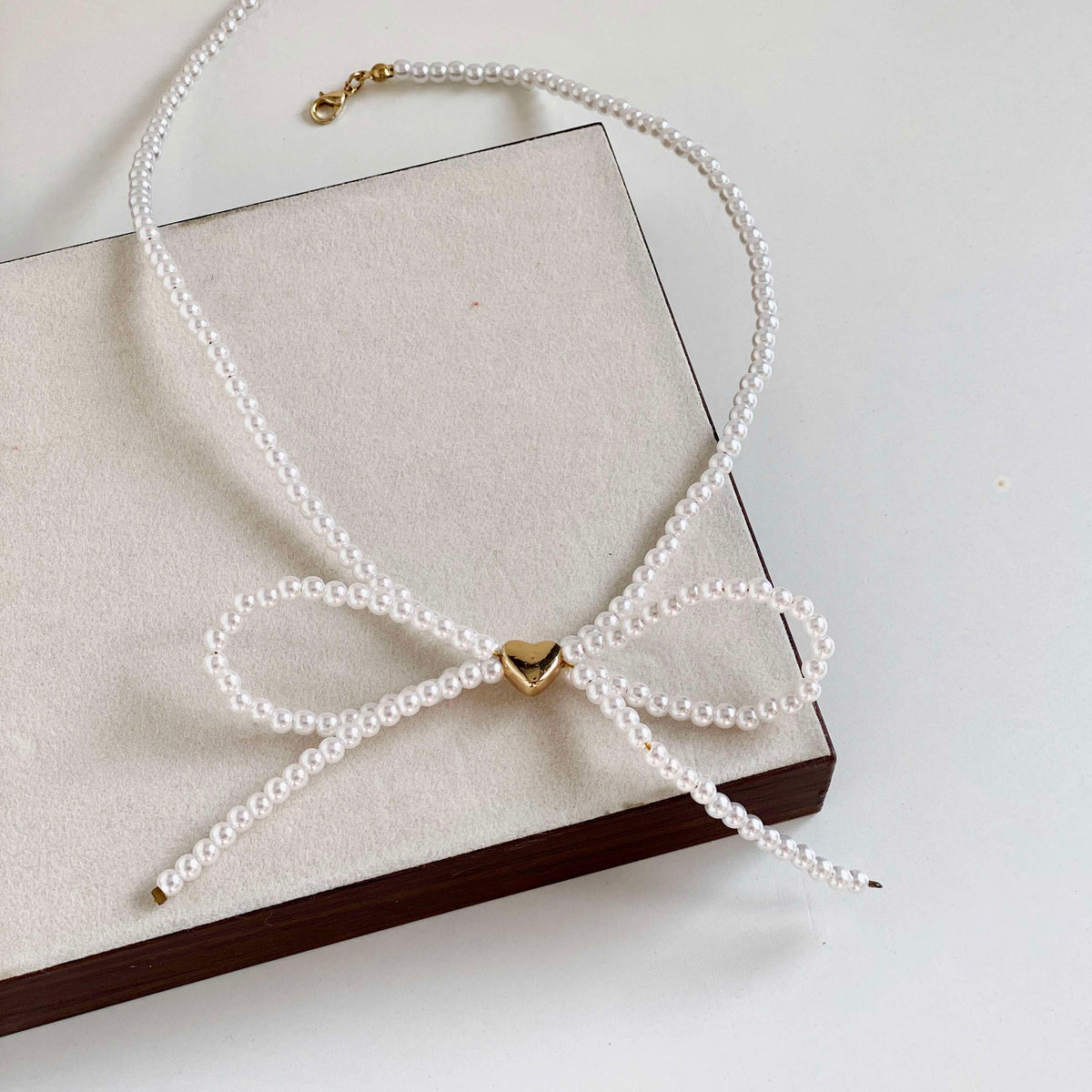 Coquette Pearl Bow Necklace